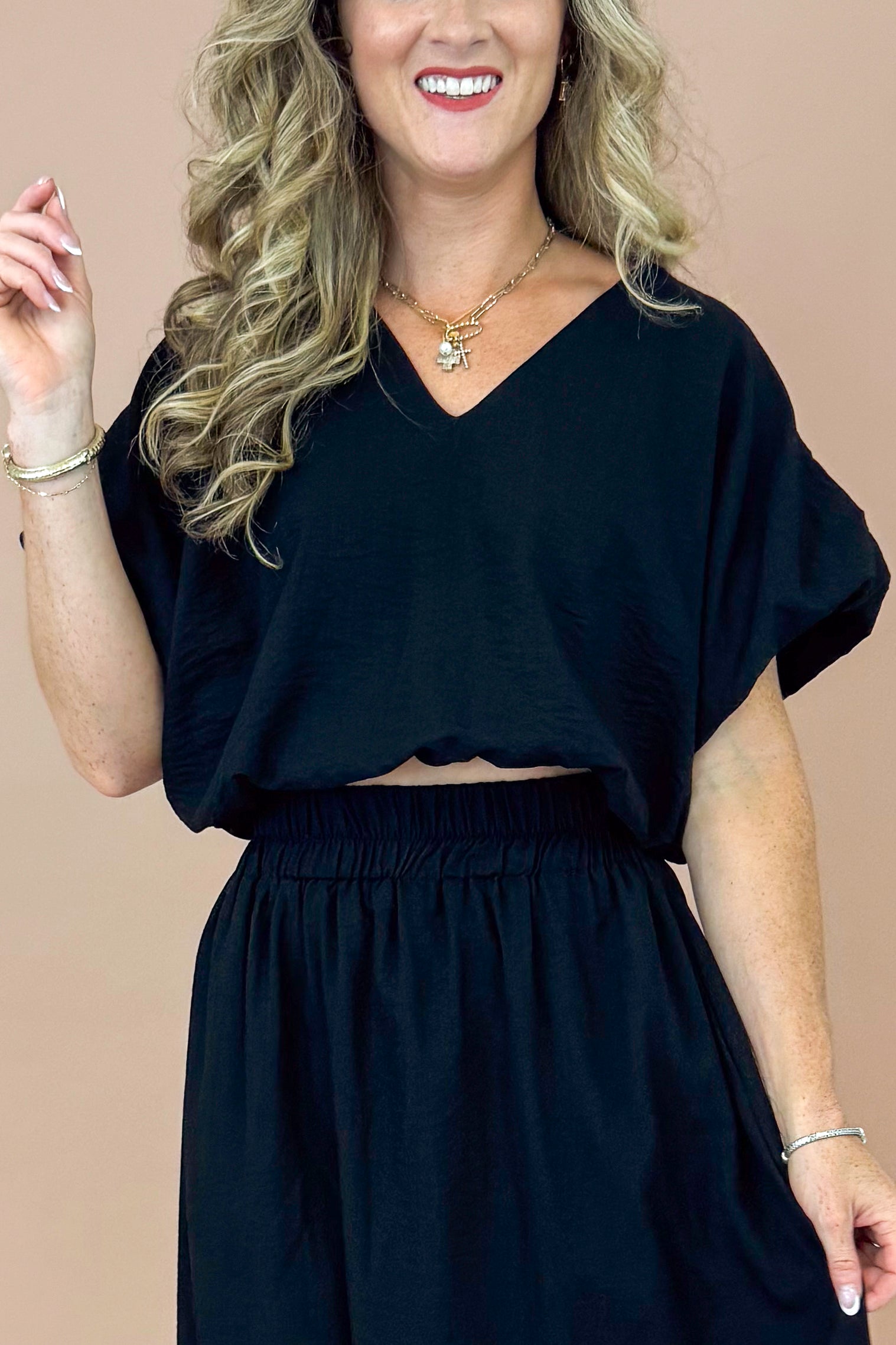 Jet Set Black V-neck Bubble Hem Top by Entro