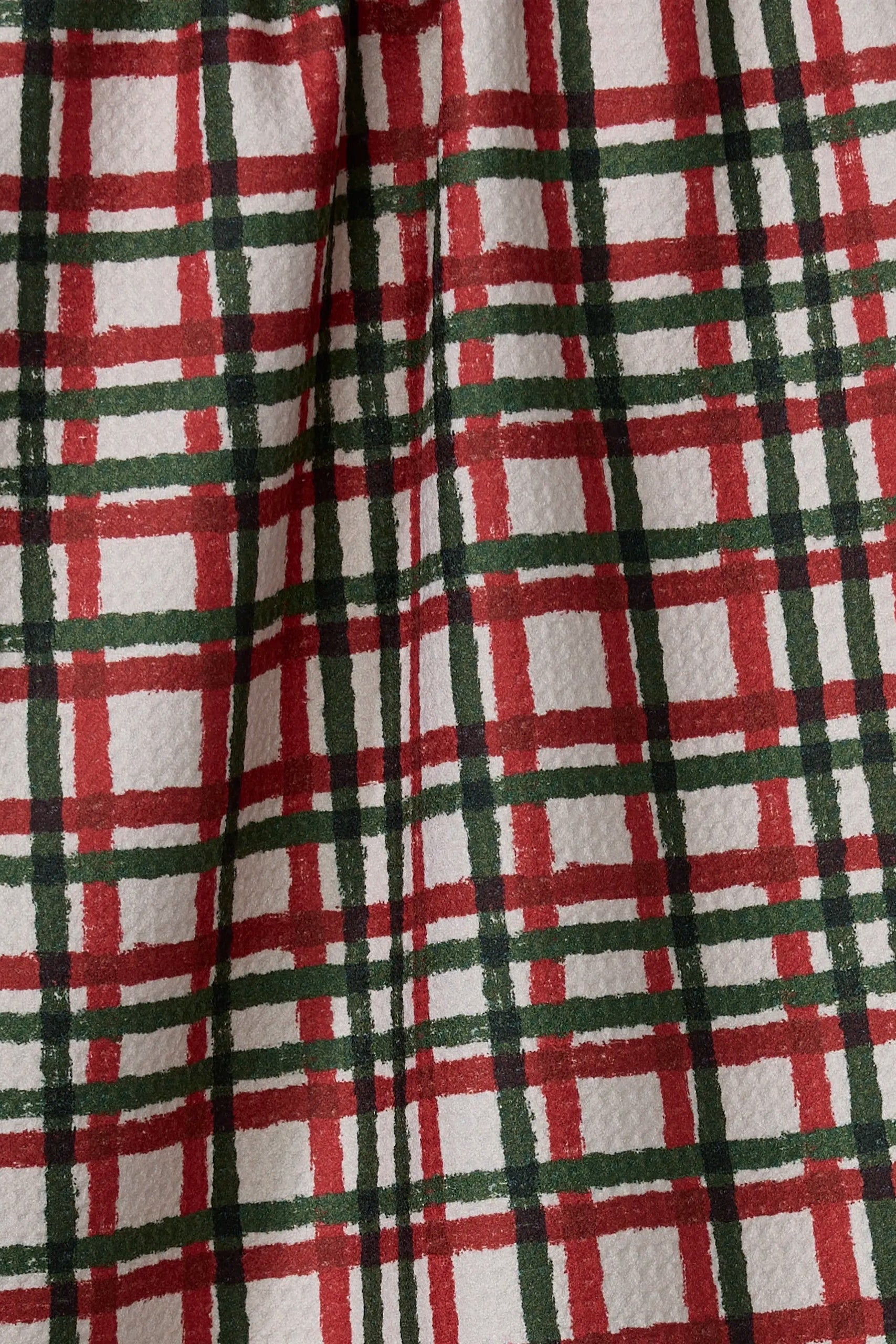 Close-up of red, green, and white plaid fabric