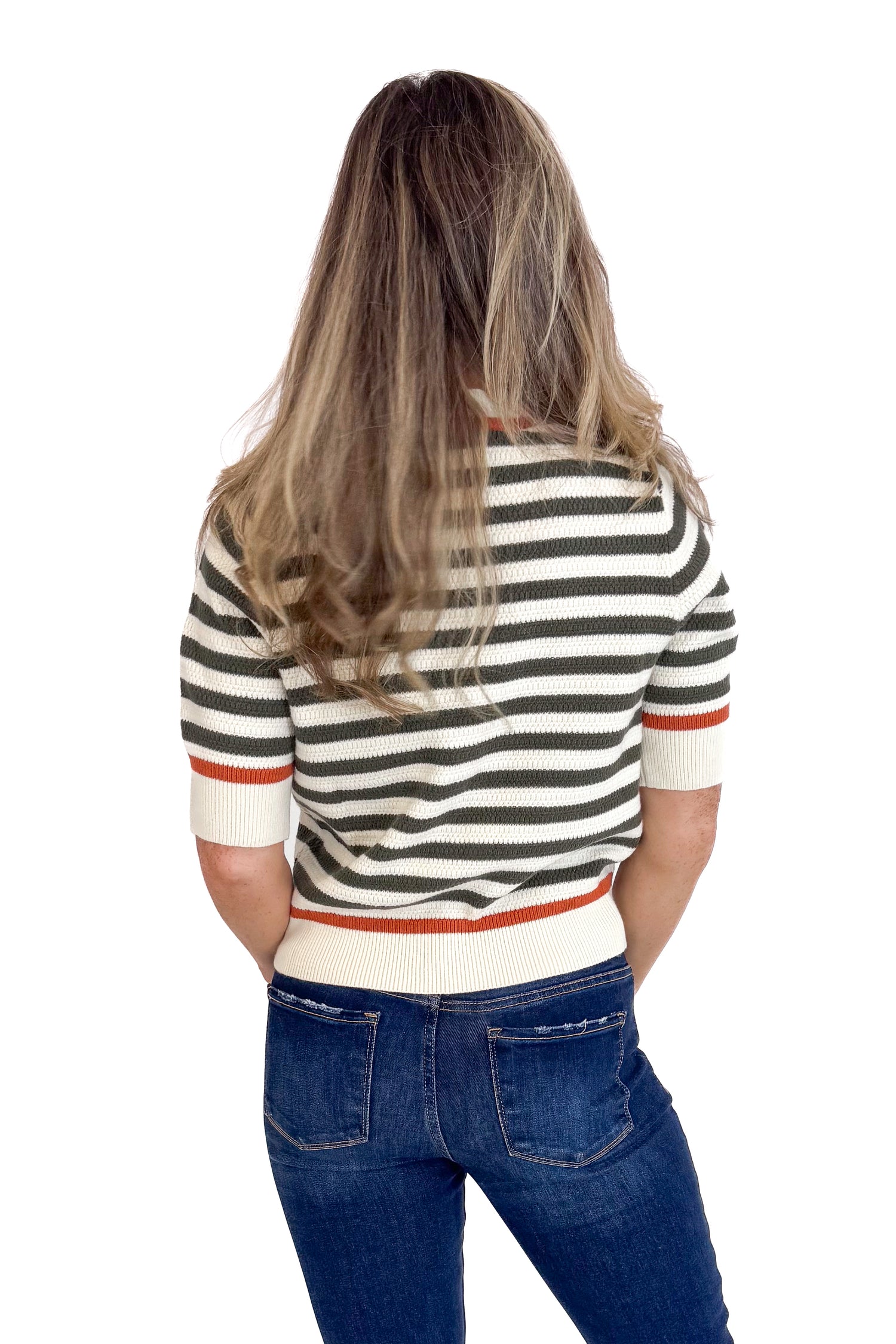 Person wearing a striped shirt and jeans from behind on a white background
