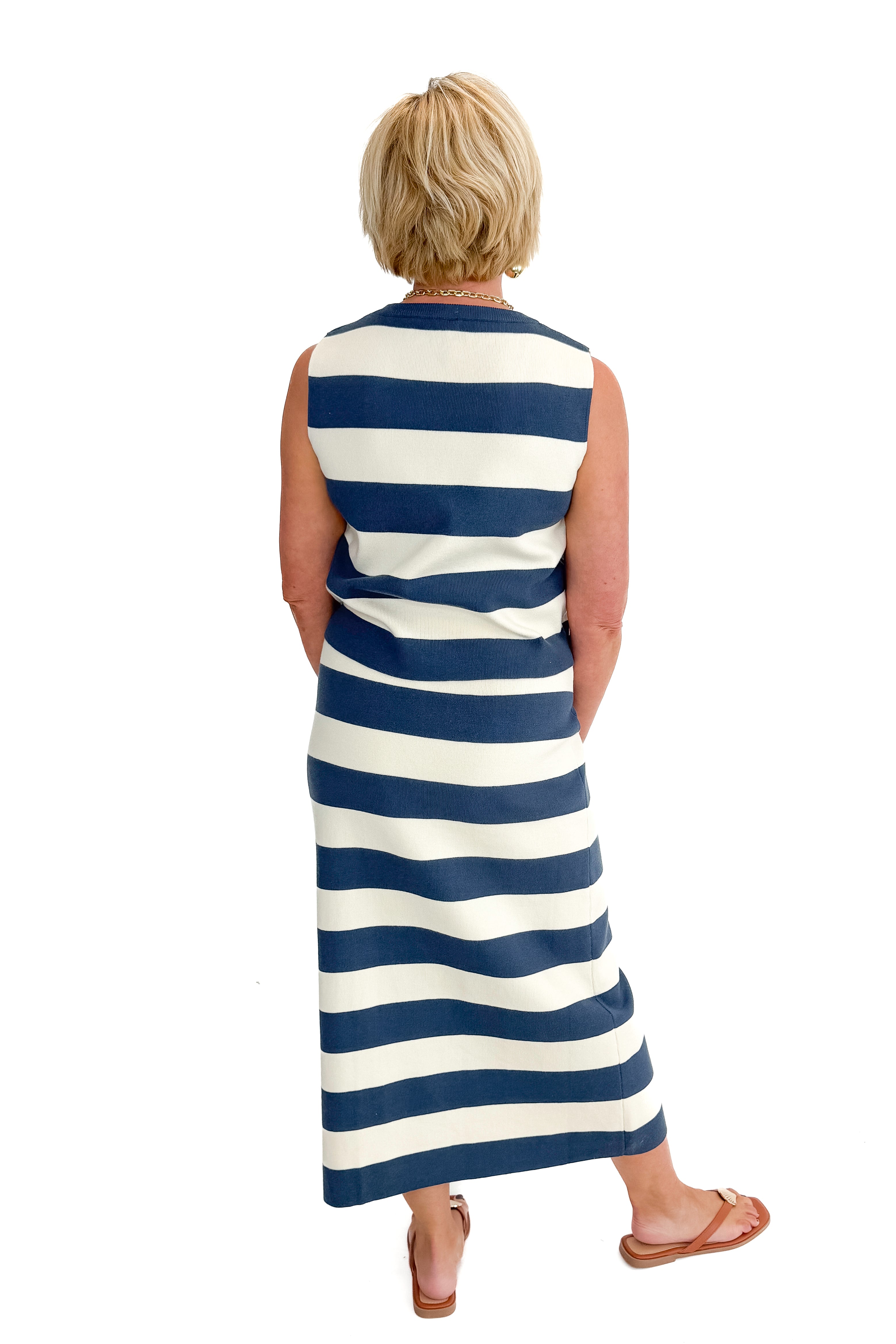 Back view of woman wearing Navy & Cream Striped Midi Skirt with matching tank against white studio background.