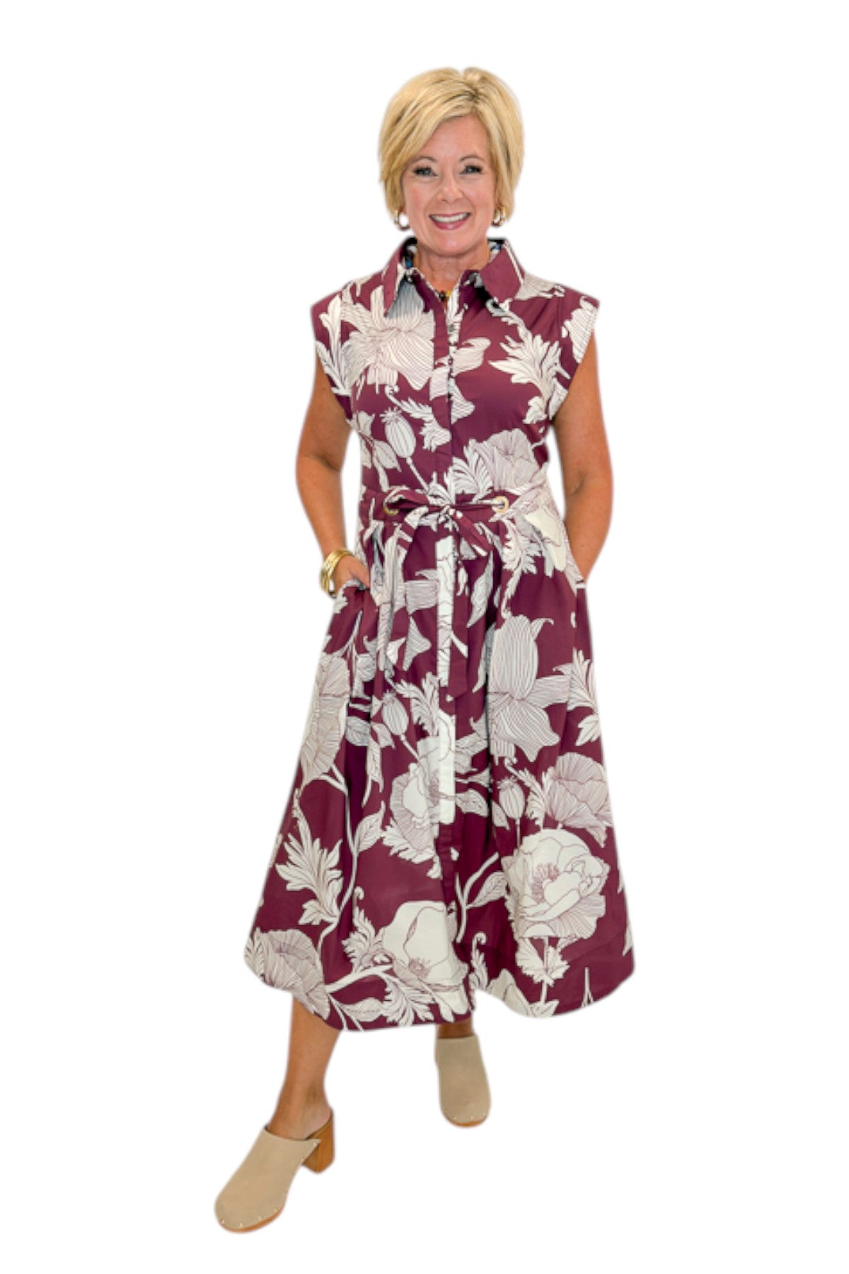 Front view of woman wearing Swagger Boutiqueās Wine Floral Tie Waist Midi Dress by Entro against white studio background.