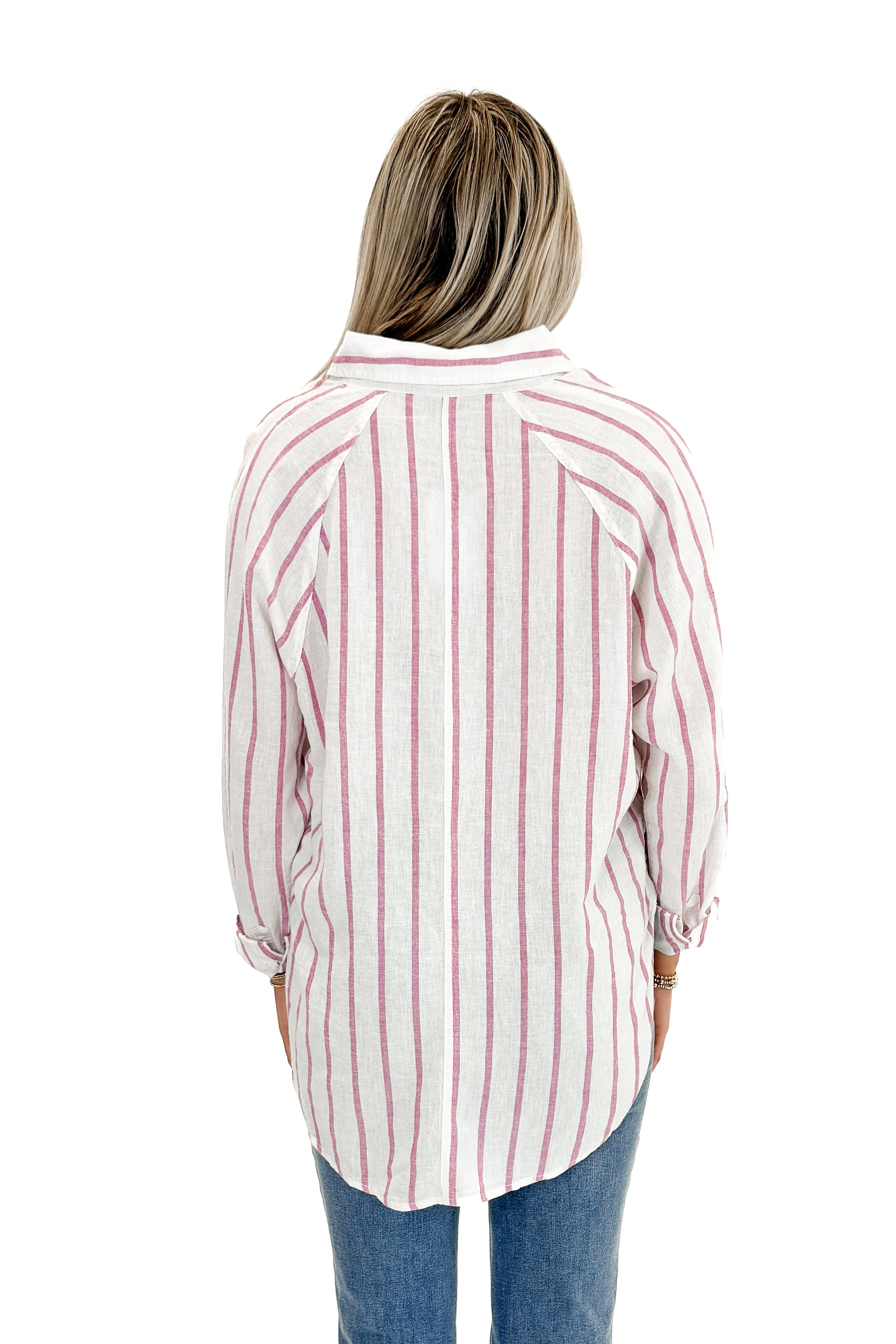 Back view of woman wearing The Perfect Line Top In Spanish Rose by Z Supply with matching shorts against white studio background.
