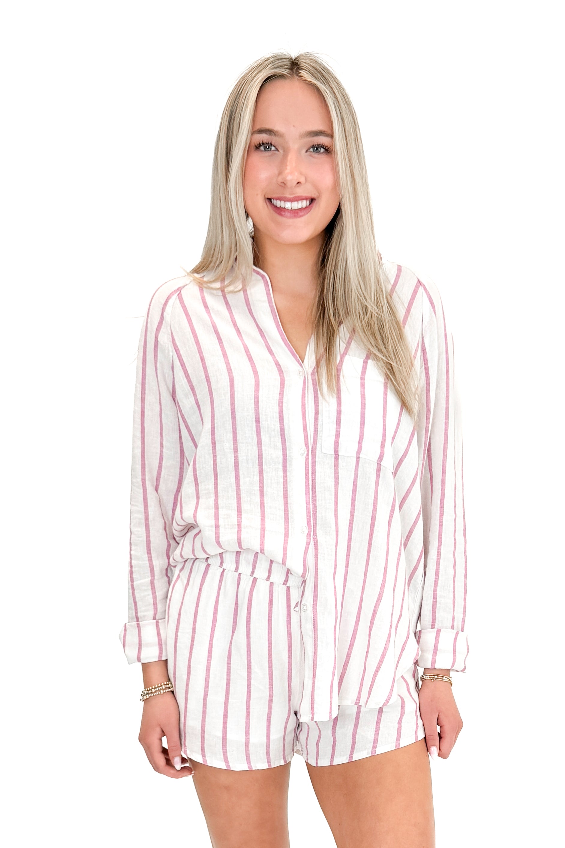 Front view of woman wearing The Perfect Line Top In Spanish Rose by Z Supply with matching shorts against white studio background.