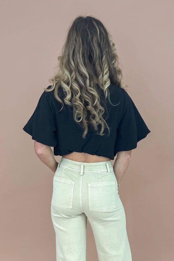 Just Landed Black Bubble Hem Short Sleeve Top