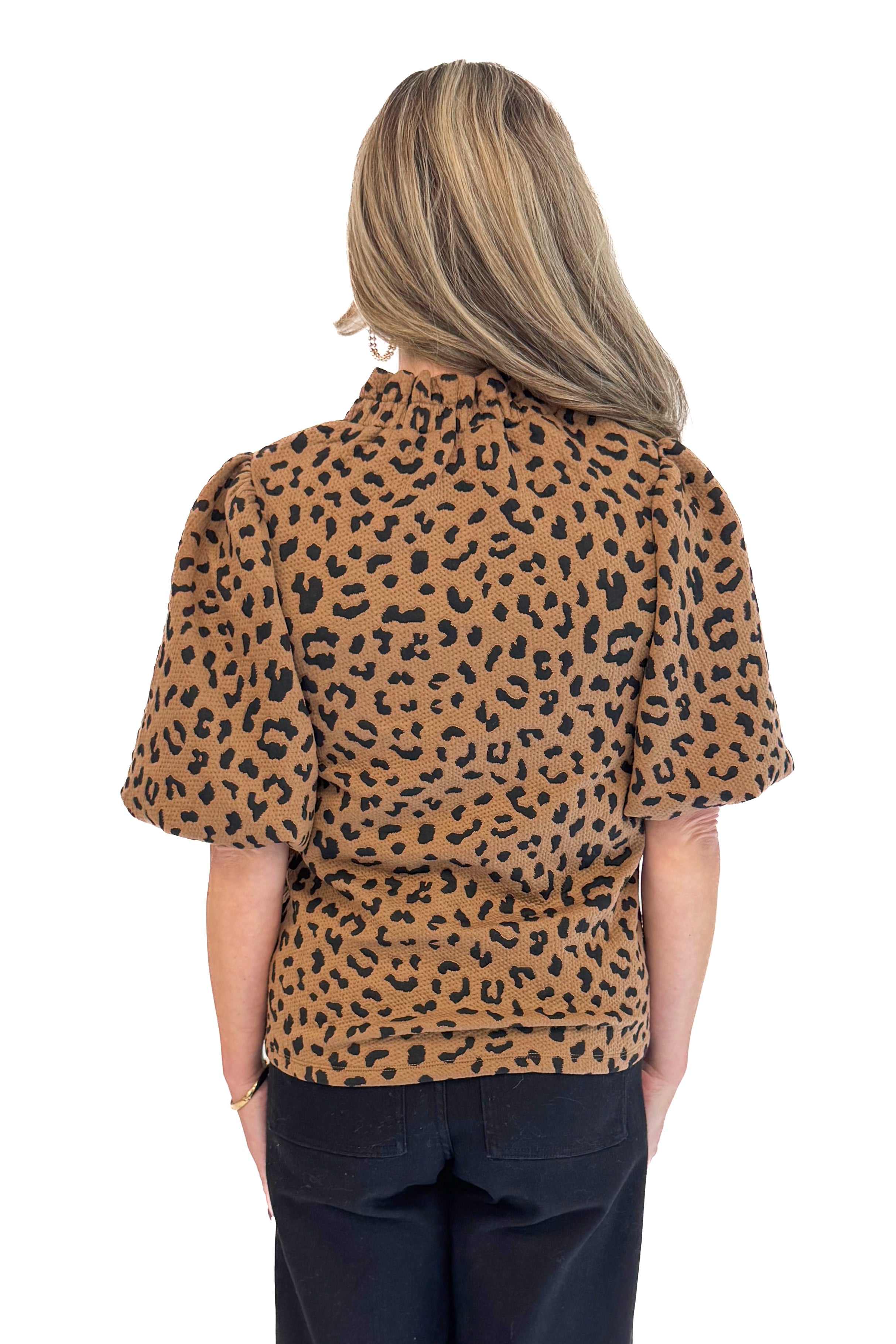 Back view of woman wearing Leopard Puff Sleeve Textured Top by THML.