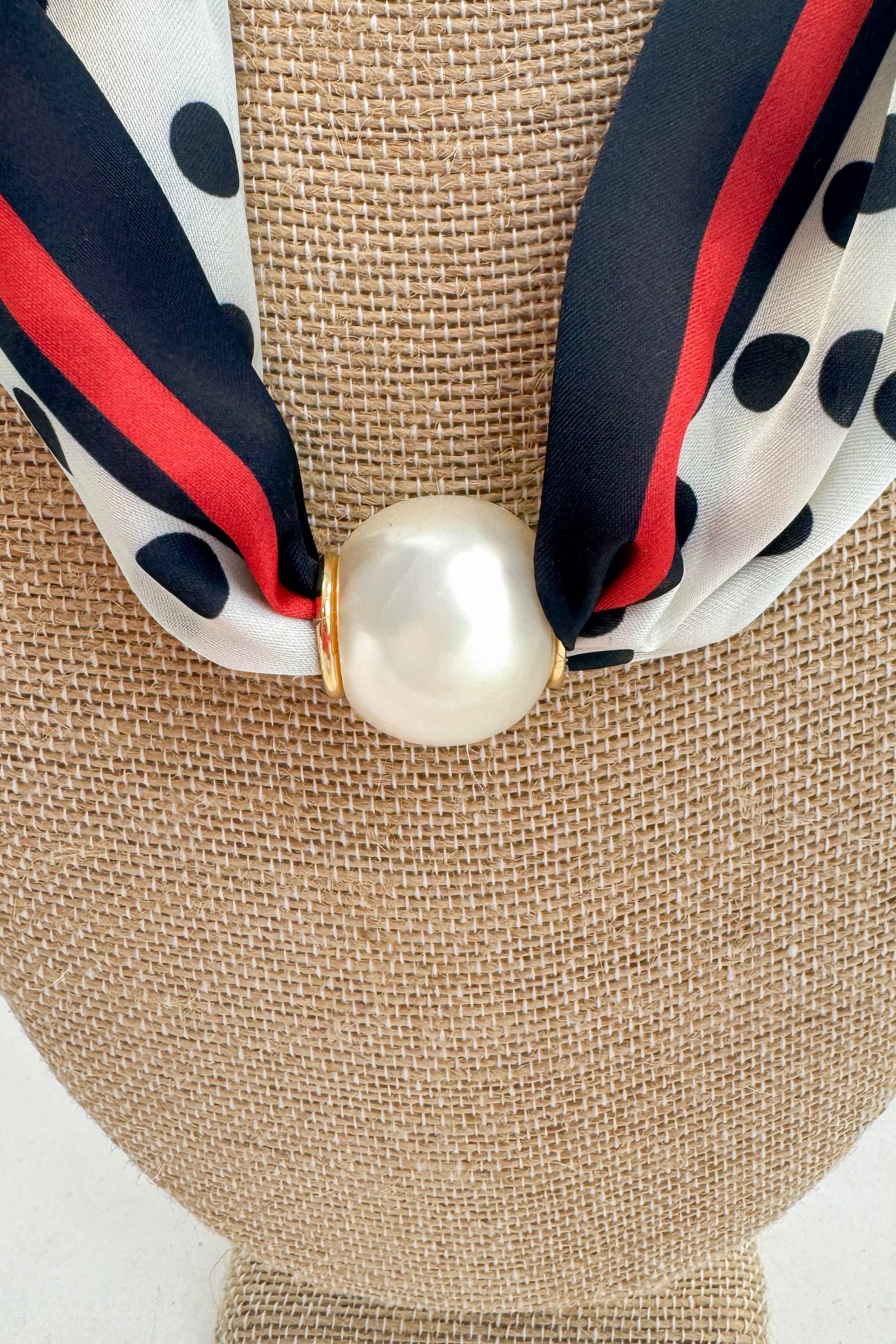 polka dot with red lining detail scarf necklace with magnetic pearl detail