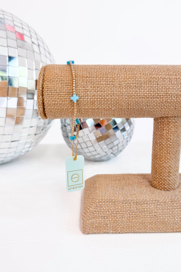 Signature Cross Turquoise/Gold Pattern 2mm Bead Bracelet by e newton