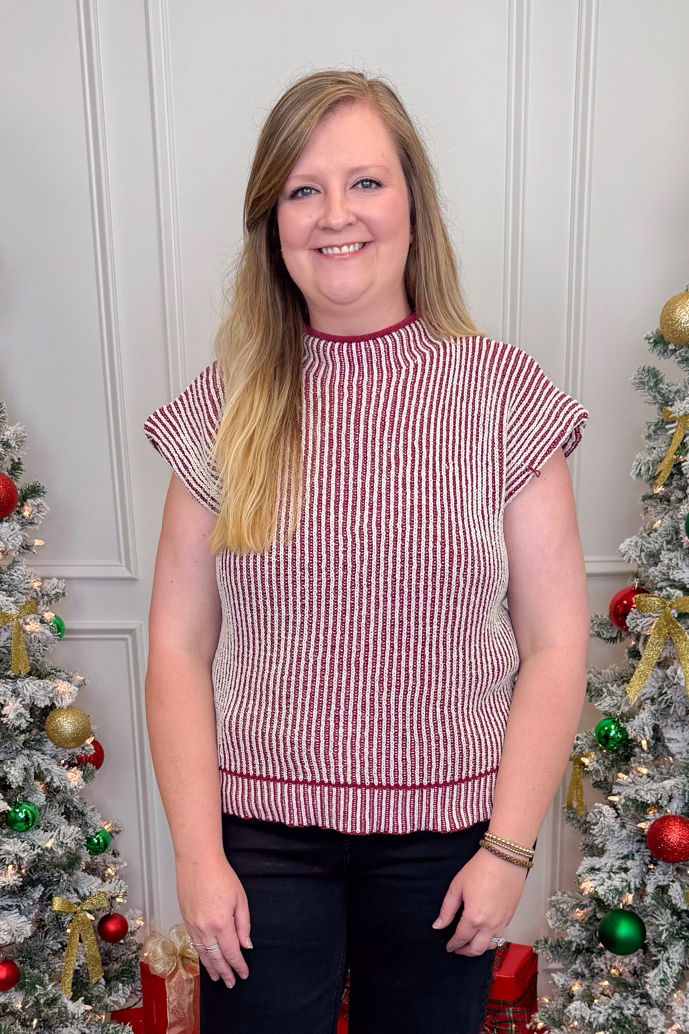 woman wearing red ribbed short sleeve sweater