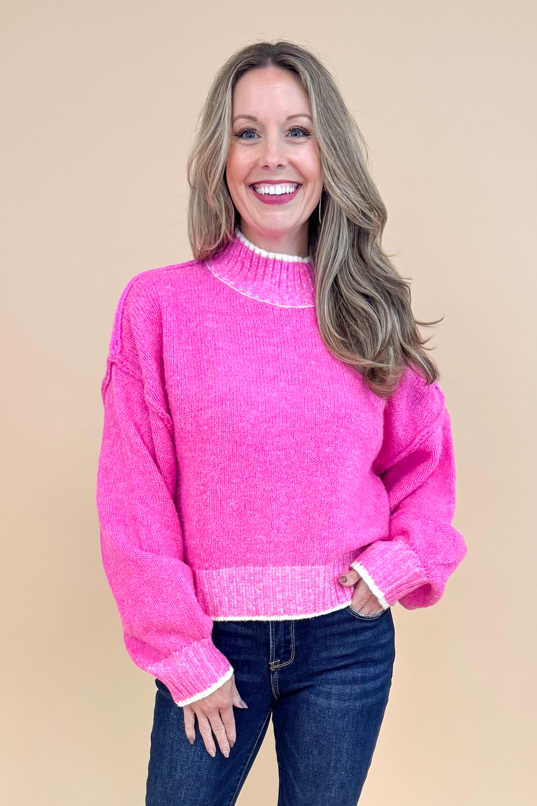 For The Record hot pink mock neck sweater - front model shot