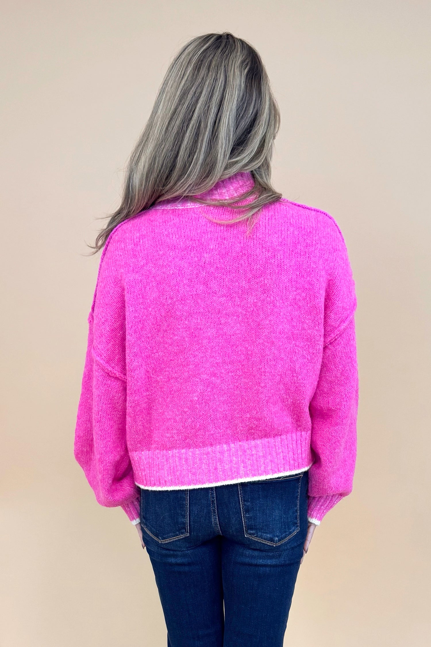 For The Record hot pink mock neck sweater - back model shot