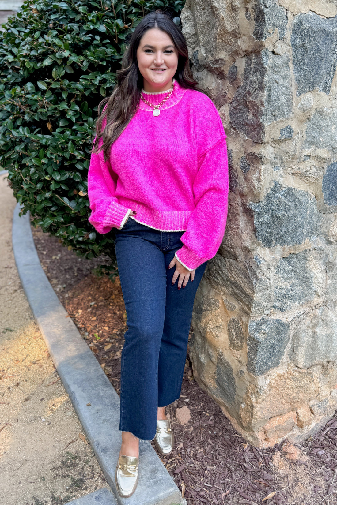 For The Record hot pink mock neck sweater - full length model shot outside