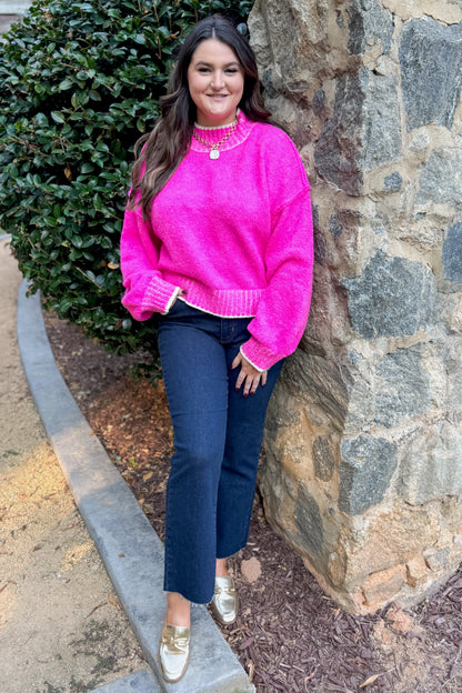 For The Record hot pink mock neck sweater - full length model shot outside