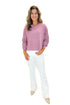 Front view of woman wearing Mauve Open Back Top with jeans against white studio background.