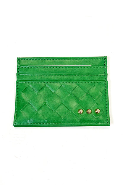 A green woven leather card holder wallet with two gold-tone metal studs on the front, displayed flat against a white background.