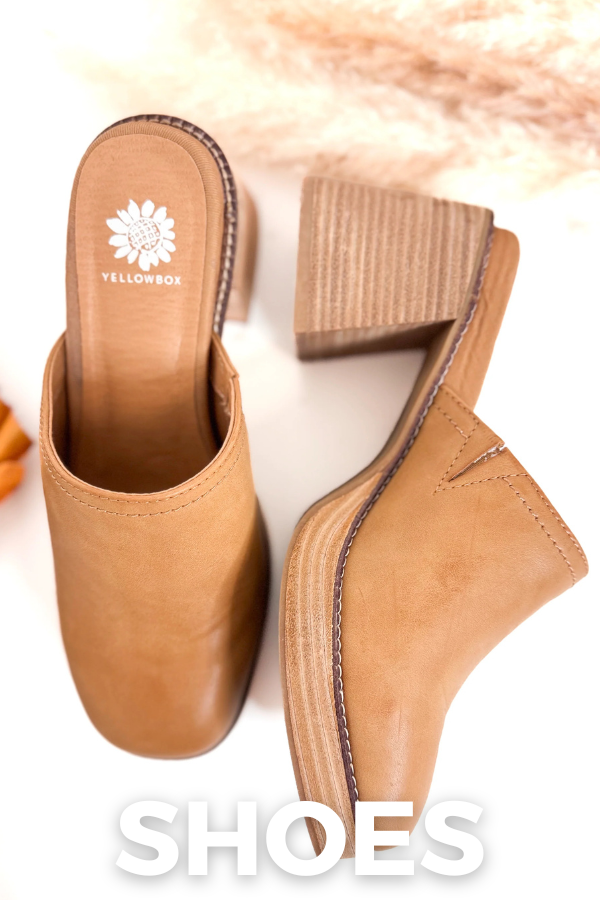 Tan shoes with a brand logo on a white background