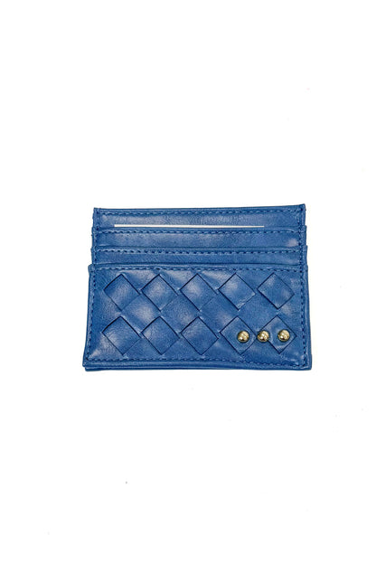 A blue leather card holder with a woven basketweave pattern and two small gold-tone studs, shown on a plain white background.