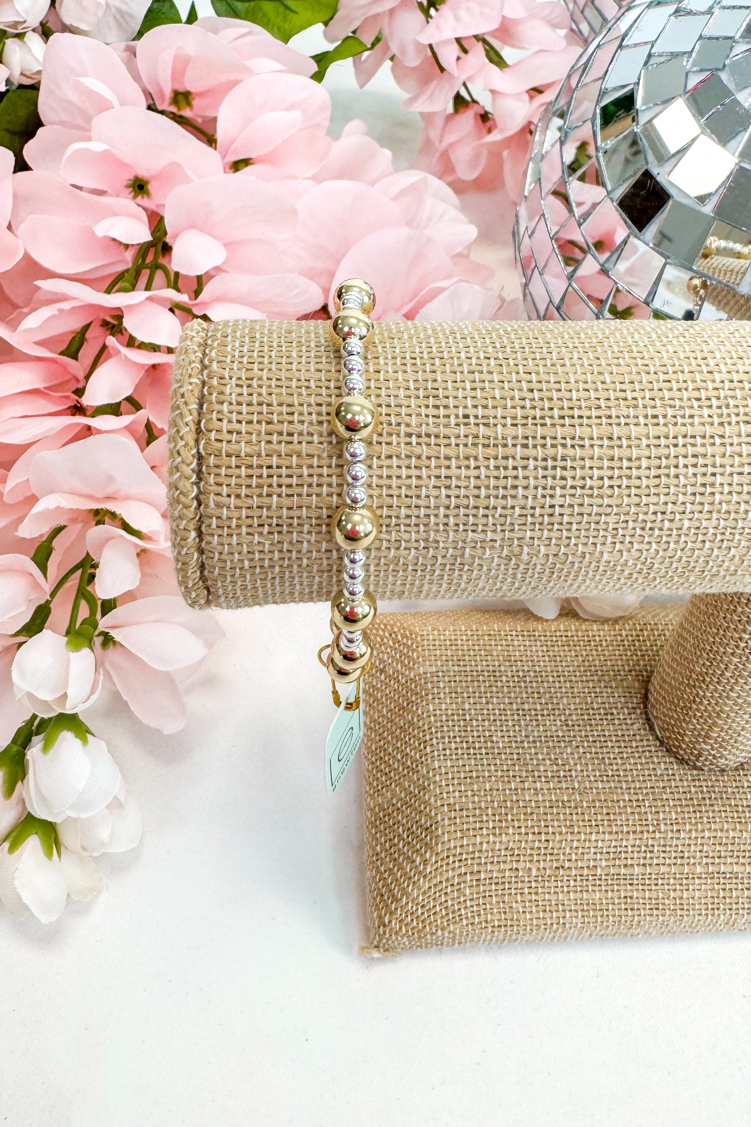 mixed metal enewton bracelet on burlap display