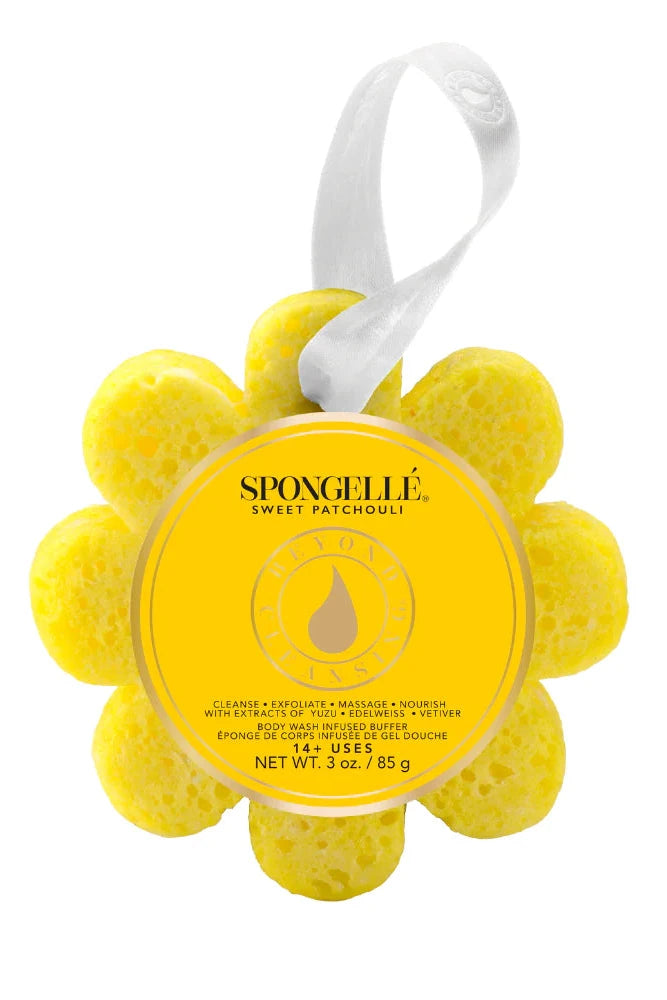 Yellow flower-shaped sponge with a label on a white background