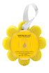 Yellow flower-shaped sponge with a label on a white background