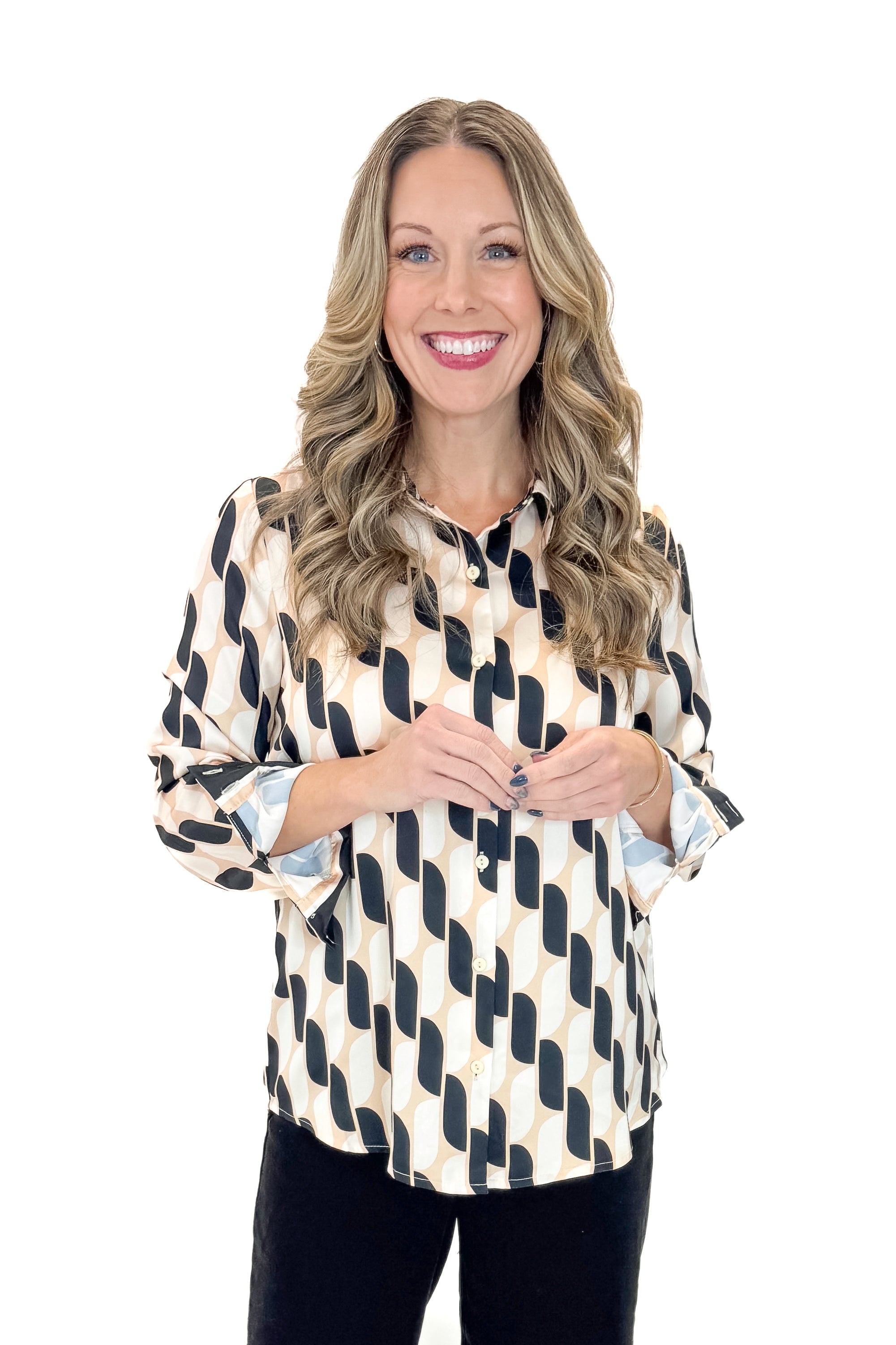 Front view of woman wearing Cream &amp; Black Abstract Print Button Up Top with jeans against white studio background.