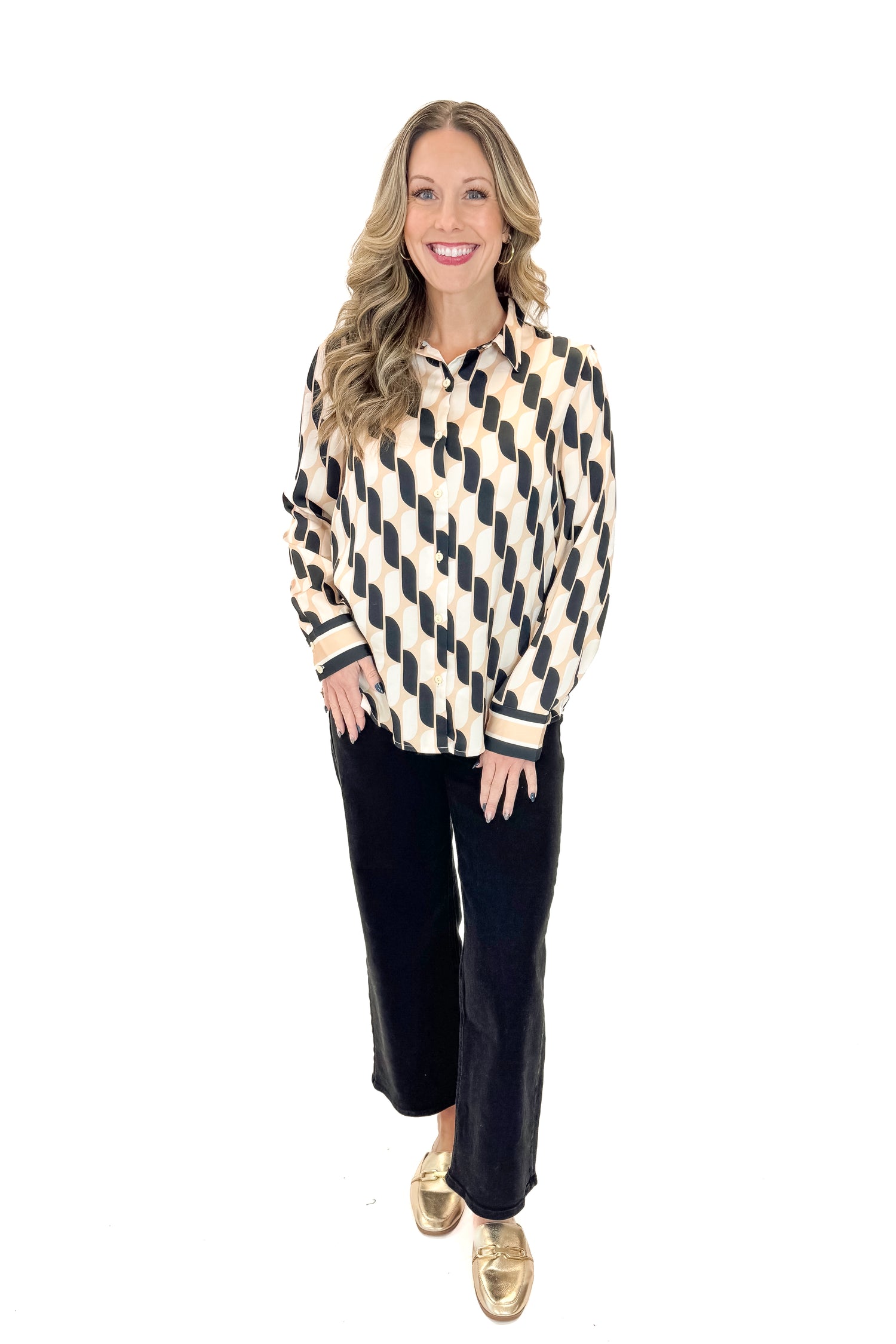 Front view of woman wearing Cream &amp; Black Abstract Print Button Up Top with jeans against white studio background.