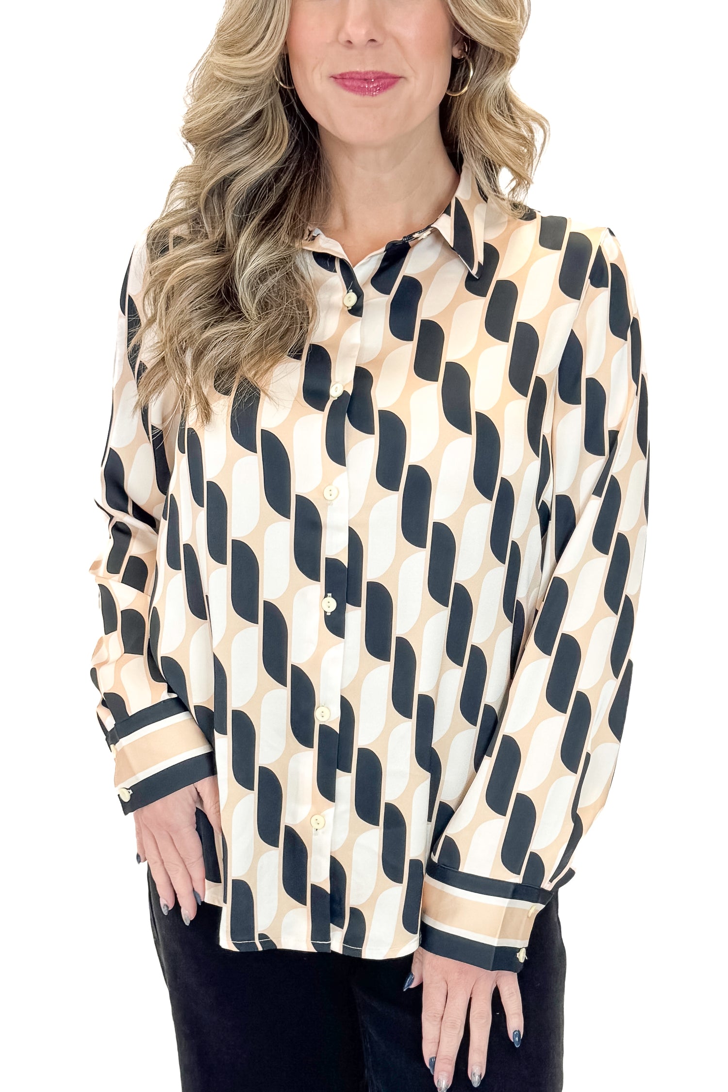 Front view of woman wearing Cream &amp; Black Abstract Print Button Up Top with jeans against white studio background.