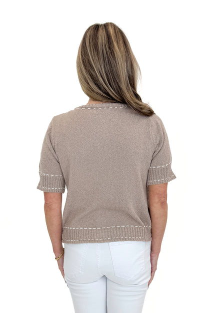 Back view of woman wearing Taupe Faux Stitch Detail Short Sleeve Sweater with jeans against white studio background.