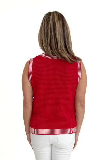 Back view of woman wearing Red &amp; White Textured Sweater Tank with jeans against white studio background.