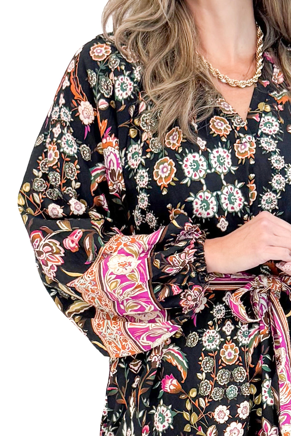 Detailed view of woman wearing Black &amp; Multi Printed Midi Dress with white studio background.