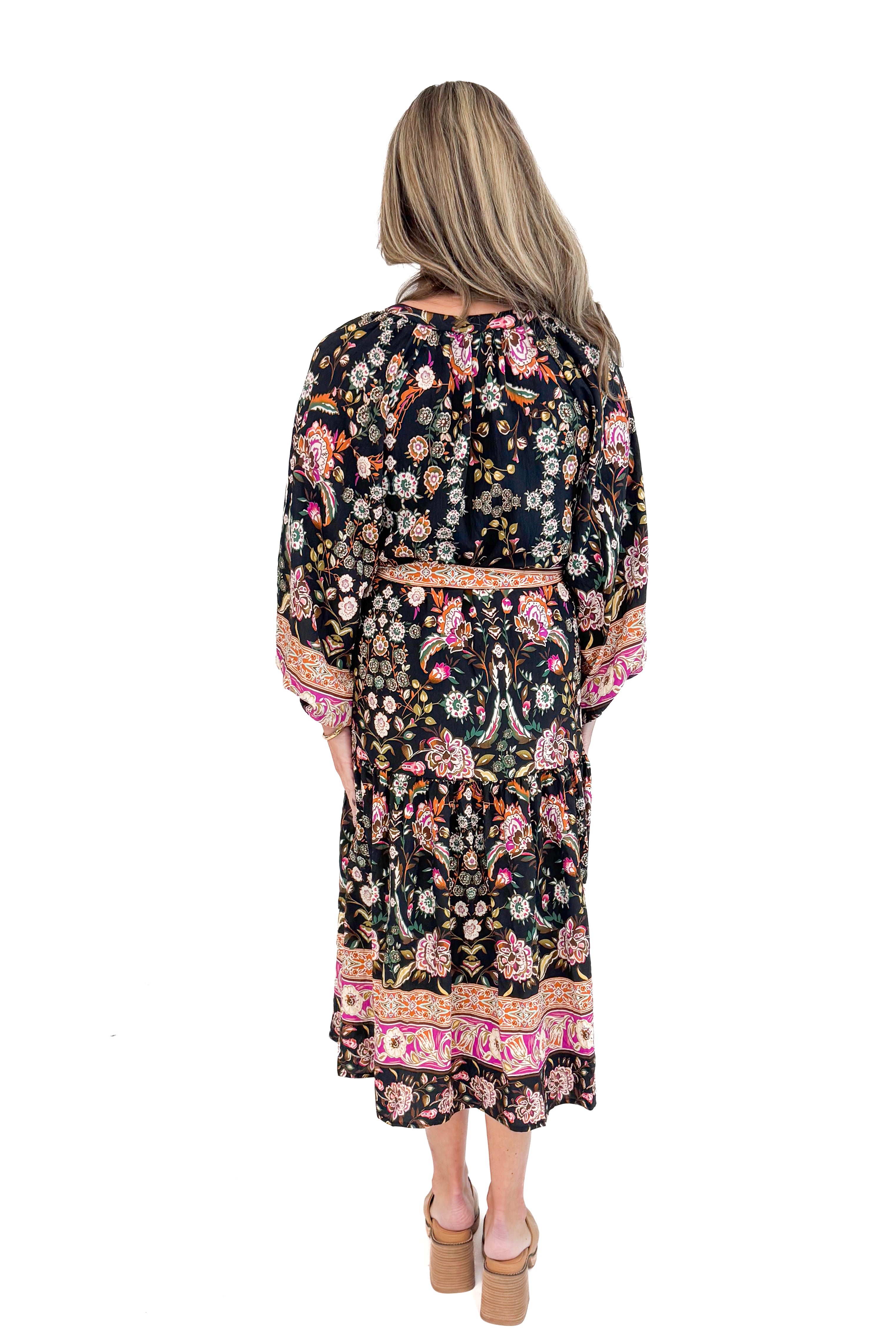 Back view of woman wearing Black &amp; Multi Printed Midi Dress with white studio background.
