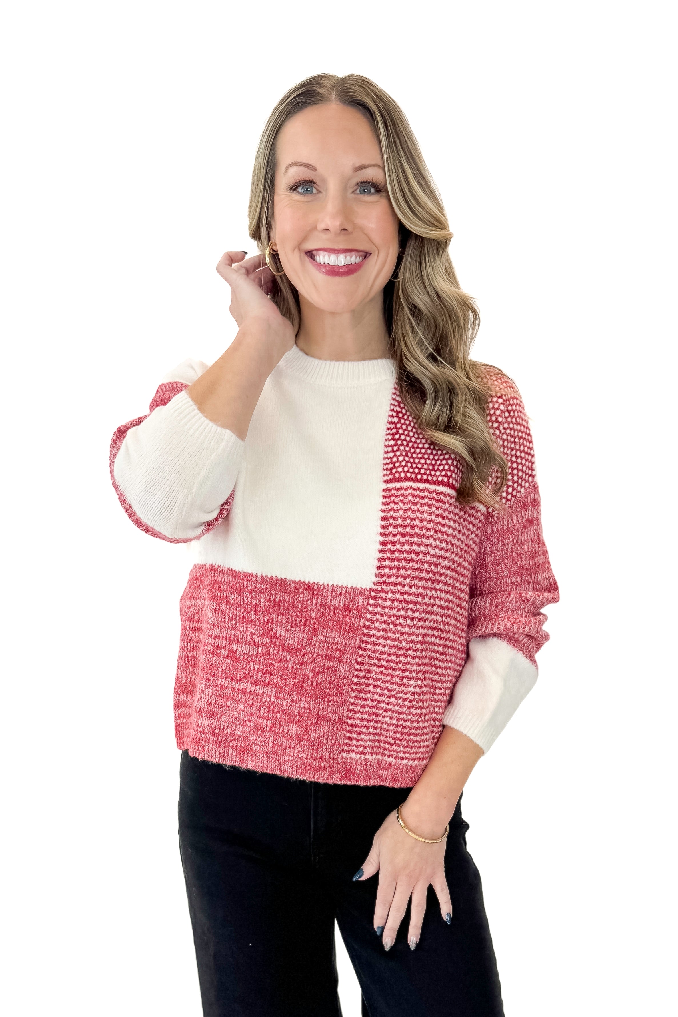 Front view of woman wearing Cream &amp; Red Color Block Sweater with jeans against white studio background.