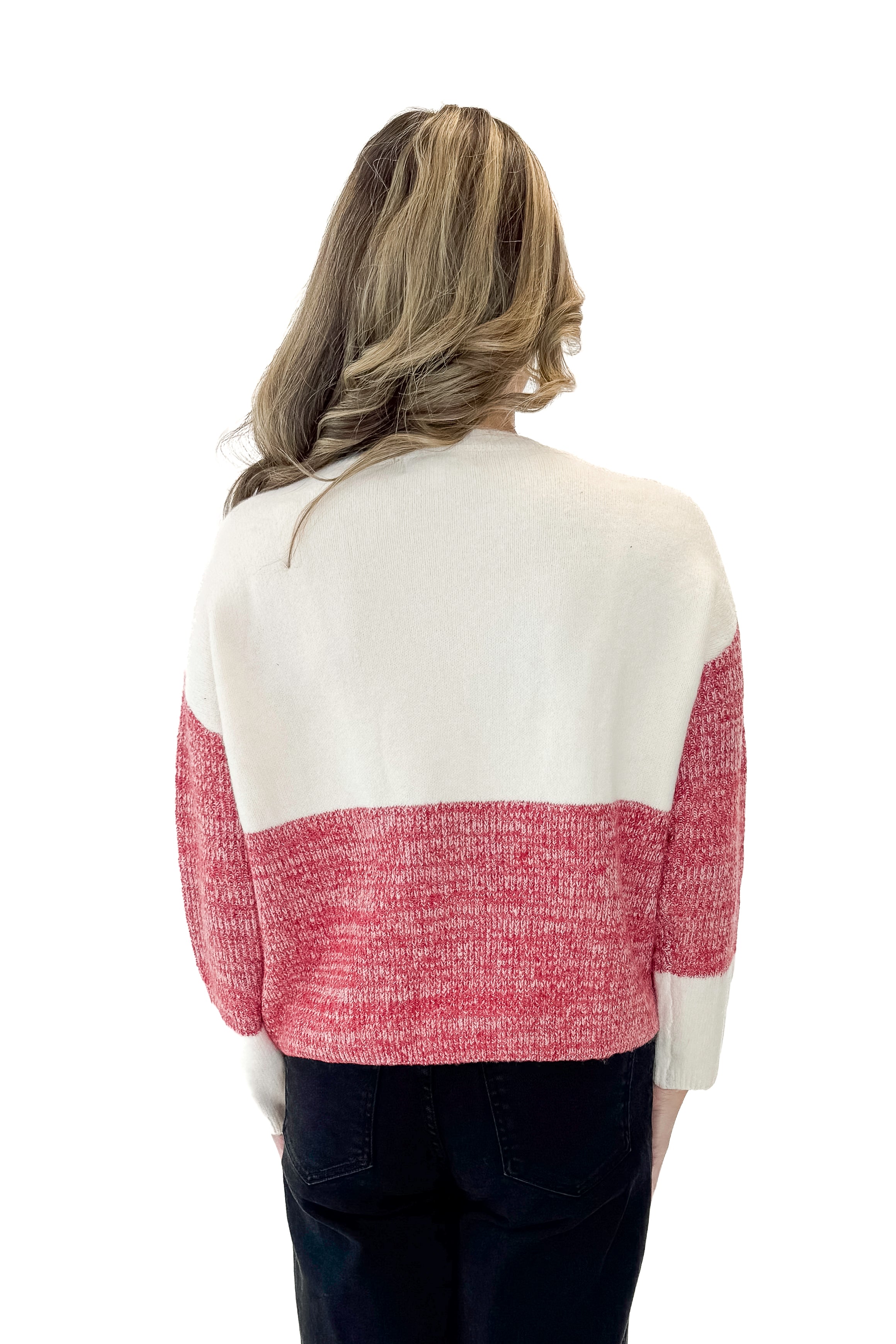 Back view of woman wearing Cream &amp; Red Color Block Sweater with jeans against white studio background.
