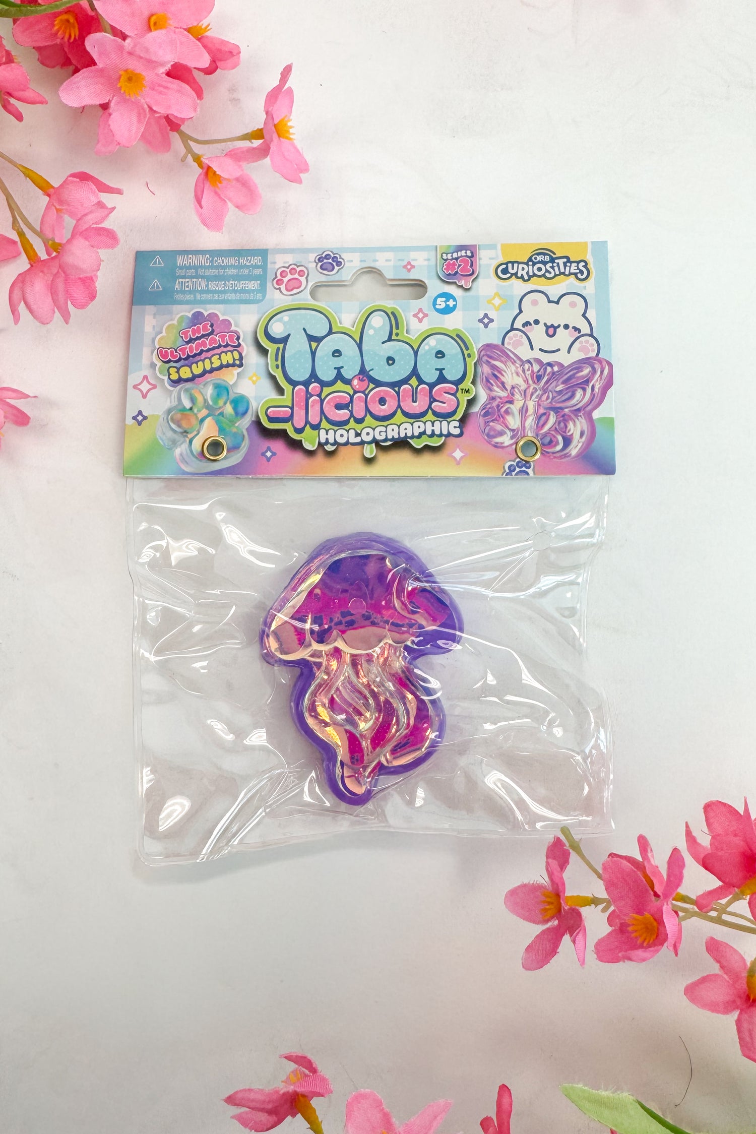 Packaged holographic jellyfish toy with &