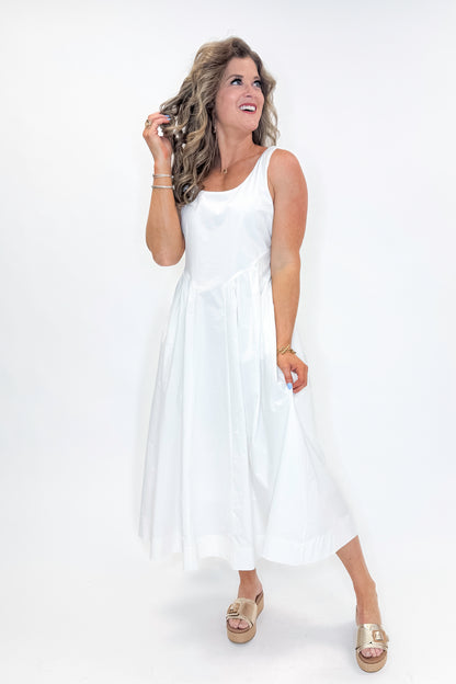 Front view of woman wearing Off White A-Line Midi Dress by PINCH against white studio background.