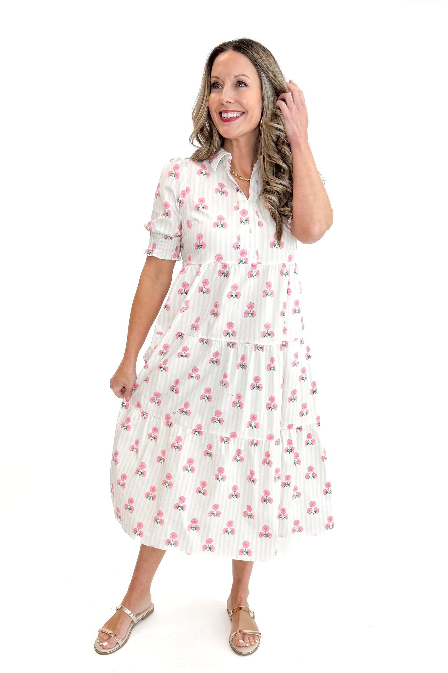 Front view of woman wearing Neutral Stripe &amp; Pink Floral Molly Dress by Mary Square with sandals against white studio background.