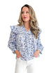 Front view of woman wearing Blue Beaufort Floral 3/4 Sleeve Top by MudPie with white jeans against white studio background.