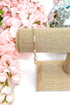 pearl enewton bracelet on a burlap stand 
