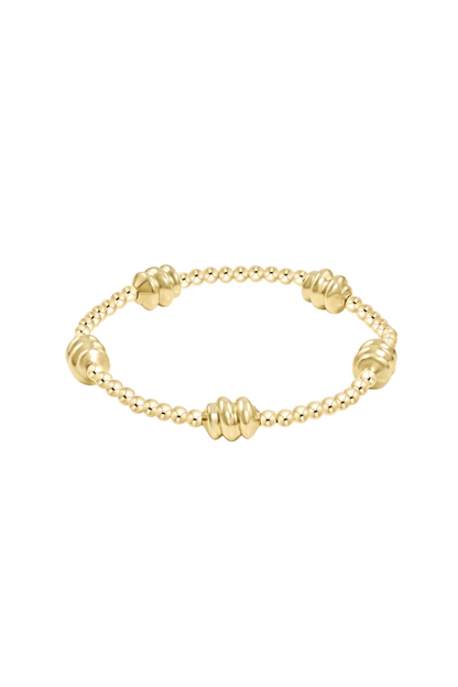Gold bracelet on a white background