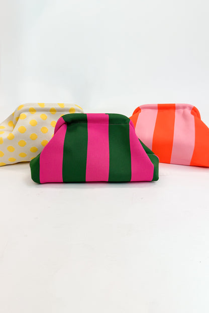 Three colorful pouches with different patterns on a white background