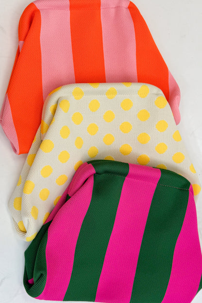 Three colorful bags with different patterns on a white background