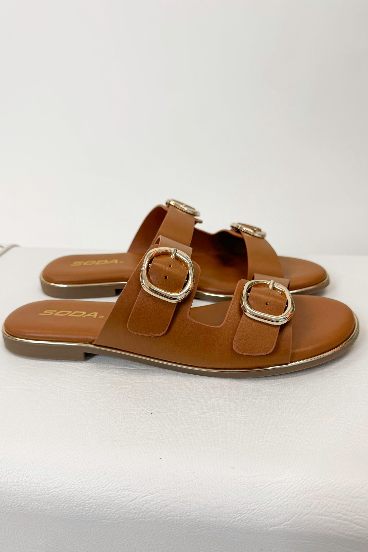 Arina- Tan Double Buckle Sandals displayed side view