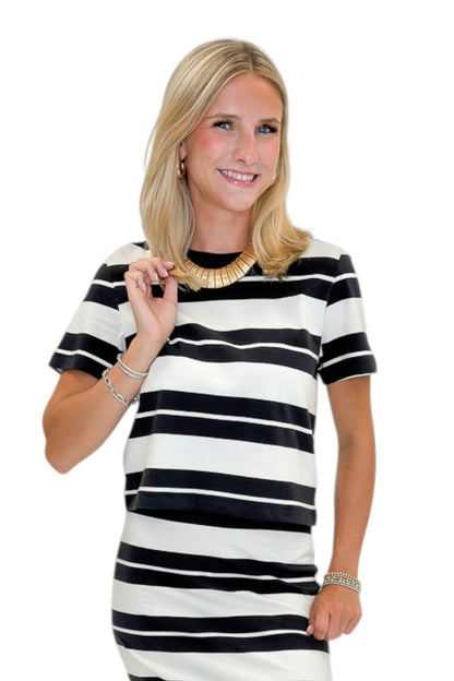 Front view of woman wearing Swagger Boutique’s Ash Black Stellan Striped Tee by Z Supply with Ash Black Gail Striped Jersey Midi Skirt by Z Supply against white studio background.