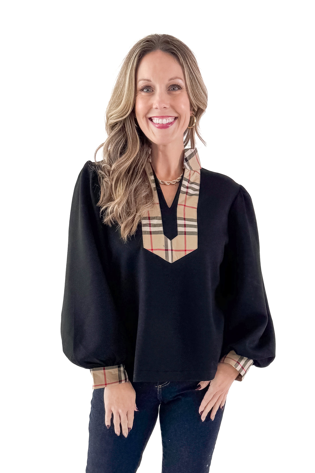 Front view of woman wearing Black With Plaid Contrast Detail Top with jeans against white studio background.