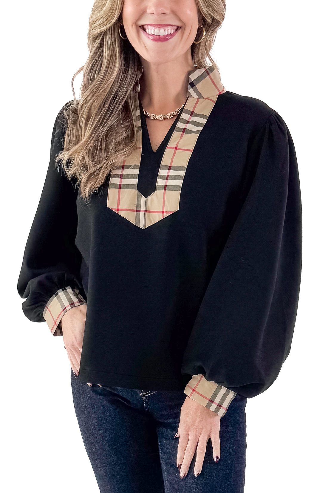 Front view of woman wearing Black With Plaid Contrast Detail Top with jeans against white studio background.