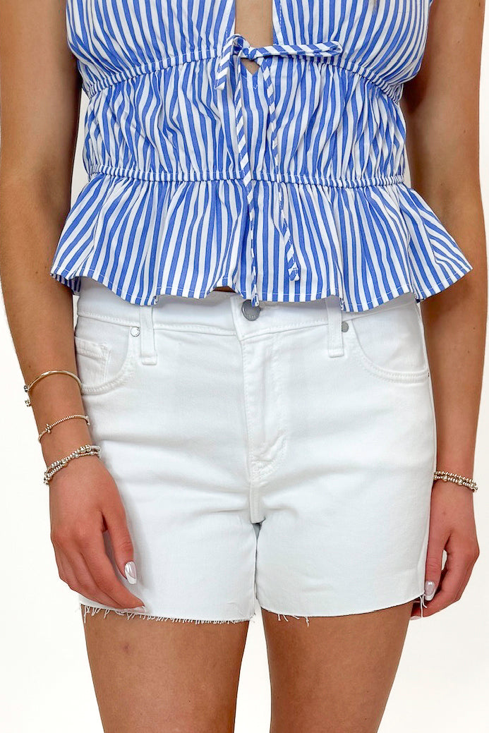 Front view of woman wearing White Stretch Shorts by Just Black Denim with top against white studio background.