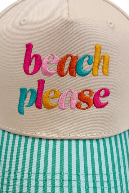 Close-up of the “beach please” embroidery on the front of the striped-brim cap.
