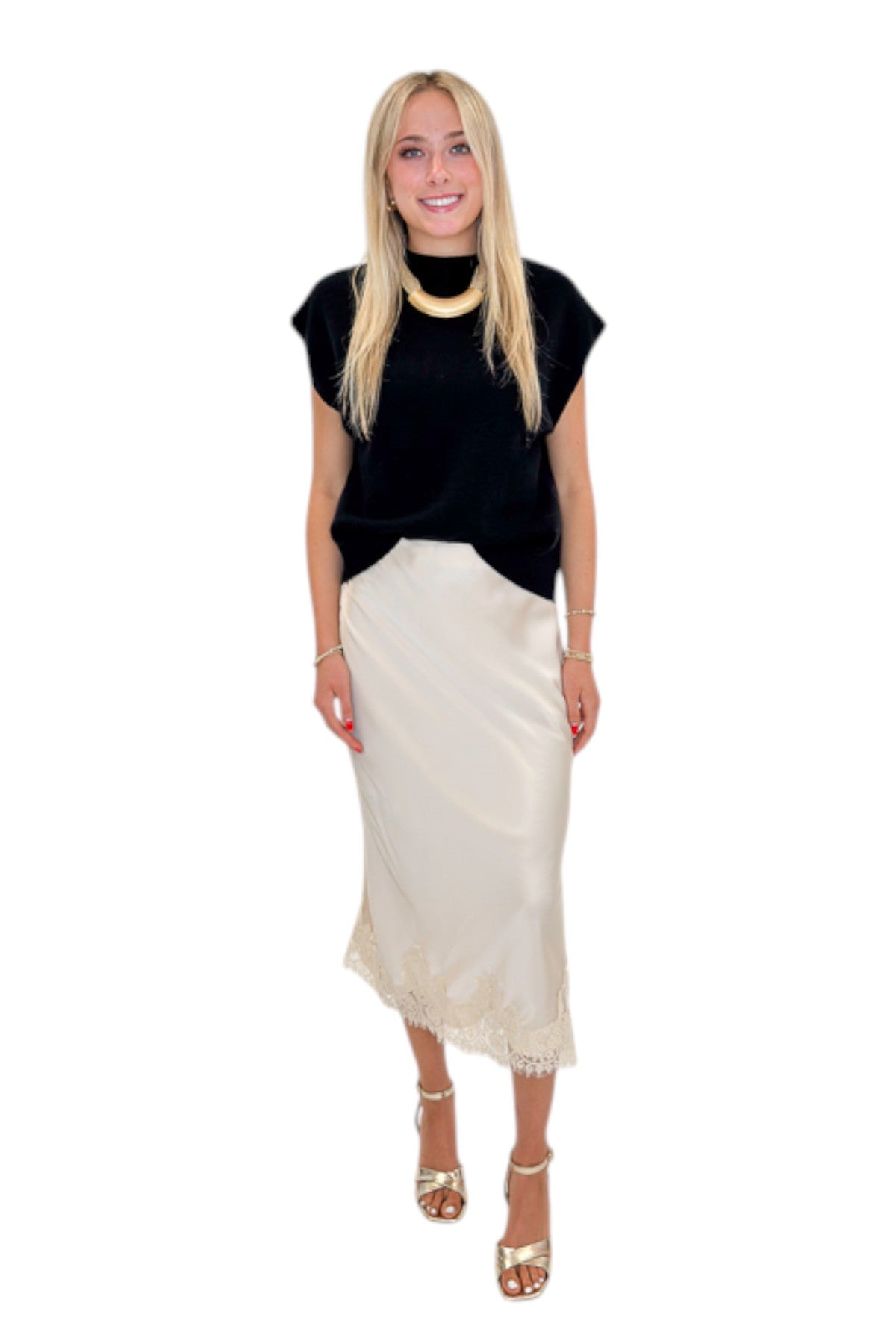 Front view of woman wearing Swagger Boutique’s Beige Satin &amp; Lace Midi Skirt with heels against white studio background.