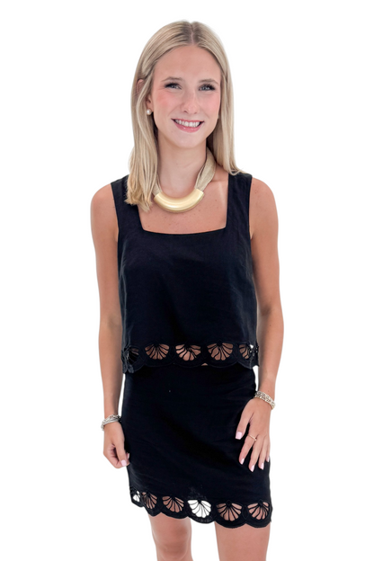 Front view of woman wearing Swagger Boutique’s Black Charlene Embroidery Top &amp; matching mini skirt set by Z Supply against white studio background.