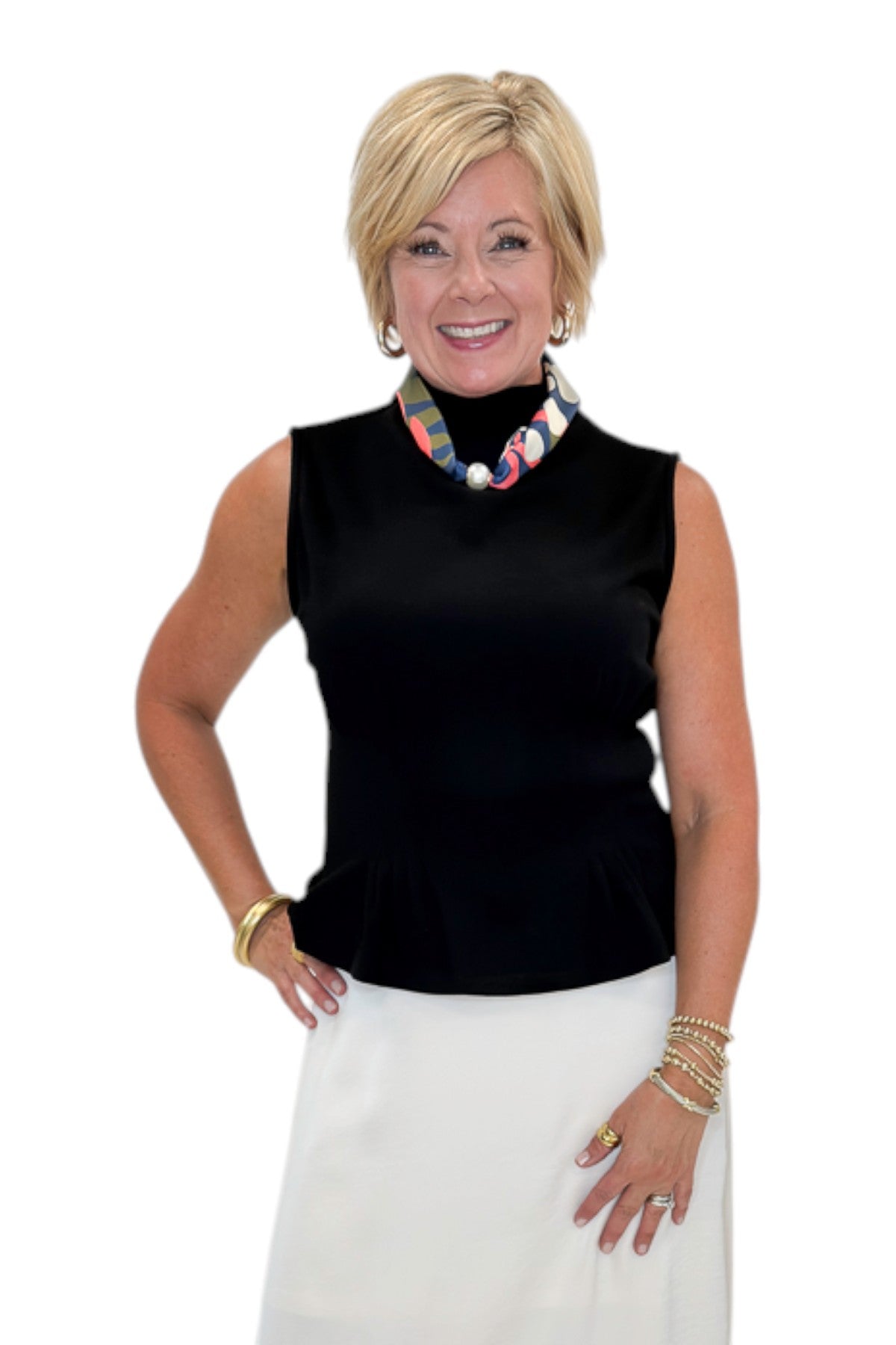 Front view of woman wearing Swagger Boutique’s Black Mock Neck Pleat Waist Top by Entro with skirt against white studio background.