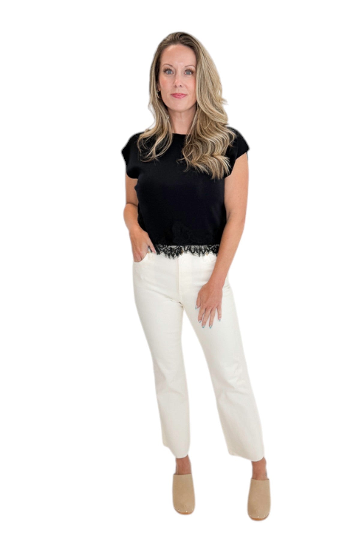 Front view of woman wearing Swagger Boutique’s Black Short Sleeve Lace Trim Top with jeans against white studio background.